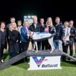 Ferdinand Boy on the winner's dais with officials and connections.