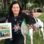 Bronwyn Welsh with Glory Fire and a photo of her first winner in 1978, Mr. Corvette.